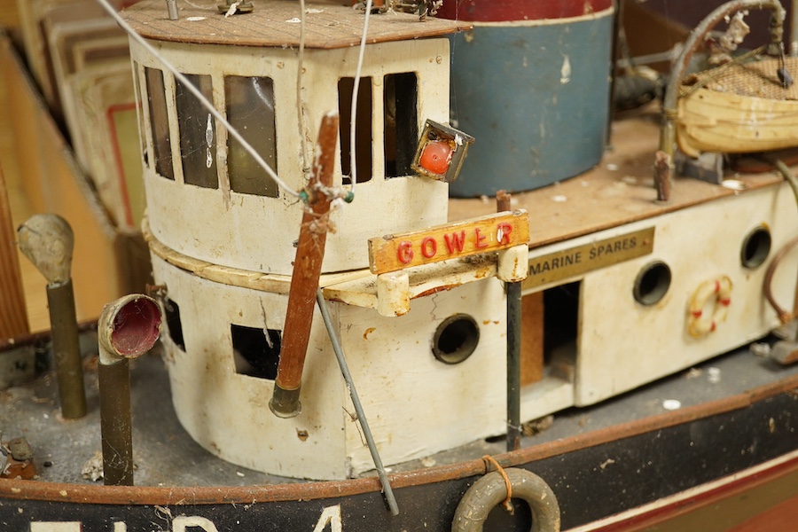 A scale model of a tug boat ‘T.I.D 4’, a well detailed model with the remains of internal wiring and electric motor for use as a pond yacht, length of hull approx 92cm. Condition - poor to fair, now in need of some resto
